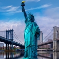 Fototapeta-Statua-wolności-na-tle-panoramy-Nowego-Yorku-Fragment.jpg