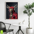 plakat-drewniana-ramka-wnetrze-renifer-w-sluchawkach.webp