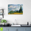 obraz-na-szkle-akrylowym-vincent-van-gogh-pole-pszenicy-z-cyprysami-wnetrze.webp