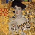obraz-na-szkle-akrylowym-gustav-klimt-zlota-adela-reprodukcja-fragment.webp