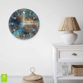 Zegar-30x30-kolo-cyfry-biale-wnetrze-struktura-granitu-z-refleksami-pomaranczy-i-turkusu.webp