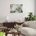Plakat Liście tropikalne w odcieniach zieleni bez ramki w pokoju