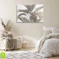 obraz-na-plotnie-stylowy-obraz-scienny-z-liscmi-palmowymi-wnetrze.webp