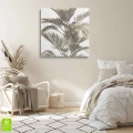 obraz-na-plotnie-stylowy-obraz-scienny-z-liscmi-palmowymi-wnetrze-kwadrat.webp