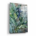 obraz-na-szkle-akrylowym-niebieska-papuga-na-lisciach-bananowca-pion-bok.webp