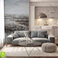 Elegancki salon z szarą welurową sofą, w którym ścianę akcentową zdobi fototapeta premium imitująca obraz olejny. Artystyczny krajobraz nadaje wnętrzu luksusowego, galeryjnego charakteru