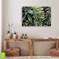 obraz-na-plotnie-tropikalne-liscie-wnetrze.webp