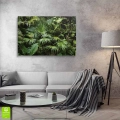 obraz-na-plotnie-gesta-dzungla-zielone-liscie-palmy-3D-wnetrze.webp