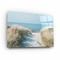 obraz-szklo-malowniczy-widok-morze-sciezka-przez-wydmy-na-plazy-bok.webp