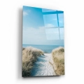 obraz-szklo-malowniczy-widok-morze-sciezka-przez-wydmy-na-plazy-bok-pion.webp
