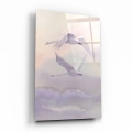 obraz-na-szkle-akrylowym-lecace-labedzie-w-chmurach-bok-pion — kopia.webp