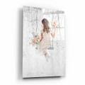 obraz-na-szkle-dziewczyna-z-kwiatami-na-hustawce-pionowy-bok.webp