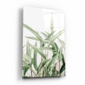 obraz-na-szkle-akrylowym-duze-zielone-liscie-bok-pion.webp