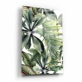 obraz-na-szkle-akrylowym-tropikalne-liscie-na-bialym-tle-bok-pion.webp