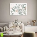 plakat-biała-ramka-wnetrze-liscie-i-kwiaty-tropikalne.webp