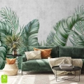 nowoczesna-fototapeta-egzotyczne-liscie-palmy-zielona-kanapa.webp