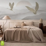 Fototapeta na wymiar - Żurawie w locie na tle wzgórz i zachodzącego słońca, klimatyczna tapeta do salonu lub sypialni