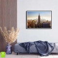 Plakat-panorama-nowego-jorku-w-sloncu-czarna-rama-wnetrze_web.webp