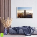 Plakat-panorama-nowego-jorku-w-sloncu-biala-rama- wnetrze_web.webp