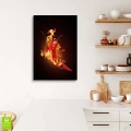 obraz-na-szkle-papryka-w-ogniu-we-wnetrzu.webp