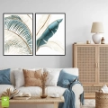 zestaw-2-plakatow-liscie-palmy-bananowca-zloty-turkusowy-czarna-wnetrze.webp