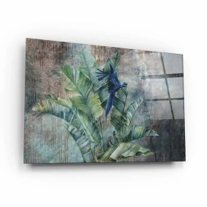 Obraz na szkle akrylowym - Cudownie niebieska papuga w liściach