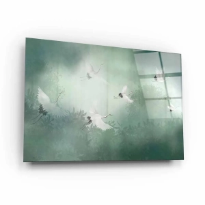 Obraz na szkle akrylowym - Czaple w locie nad zielonym lasem