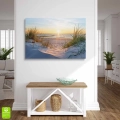 obraz-szklo-pejzaz-morski-i-trawy-na-wydmach-o-zachodzie-slonca-wnetrze.webp