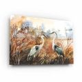 obraz-na-szkle-akrylowym-czaple-na-tle-jesiennego-krajobrazu-bok.webp