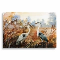 obraz-na-szkle-akrylowym-czaple-na-tle-jesiennego-krajobrazu-przod.webp