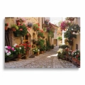 obraz-na-szkle-akrylowym-urokliwa-wloska-uliczka-3-d-w-spello-przod.webp
