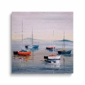 obraz-na-plotnie-kolorowe-lodki-i-spokojne-morze-kwadrat.webp