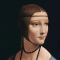 obraz-na-szkle-akrylowym-leonardo-da-vinci-dama-z-gronostajem-fragment.webp