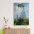 obraz-na-szkle-akrylowym-claude-monet-kobieta-z-parasolem-wnetrze.webp